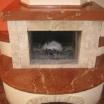 Fireplace surround with a red marble-look hearth