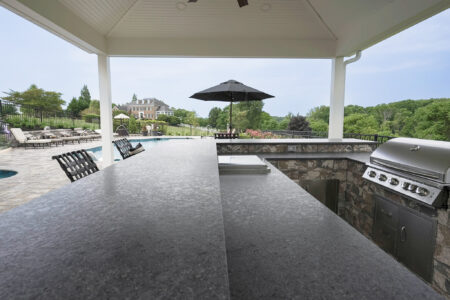 Outdoor kitchen black countertop with built-in grill