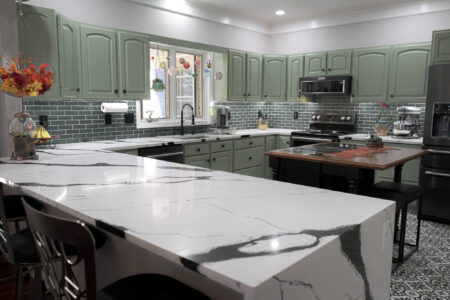 Panda quartz countertop with mitered waterfall